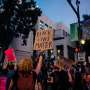 Community context shapes corporate response to violence in street protests