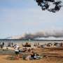 More than 80,000 flee forest infernos in France and Spain
